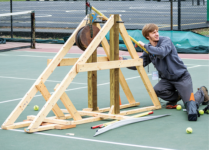 Ian Larson demonstrates trebuchet