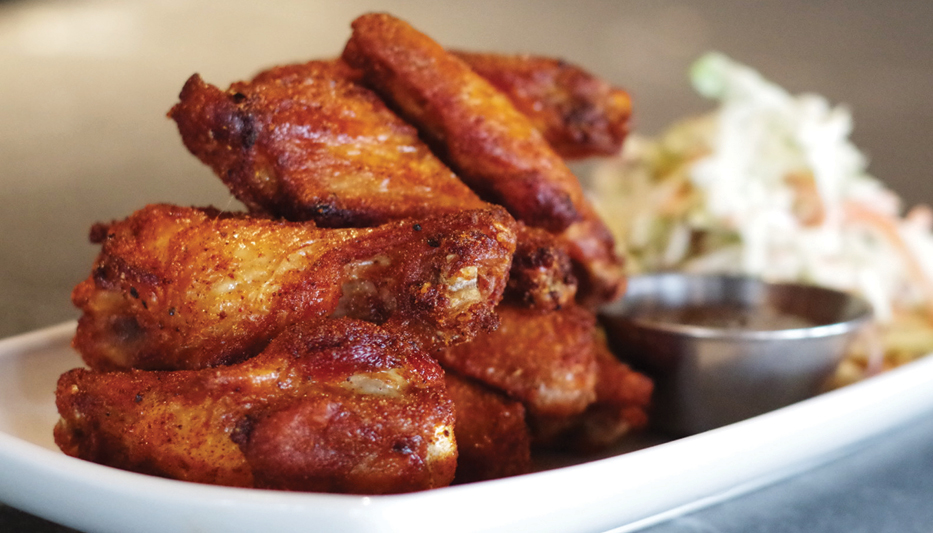 Signature Wings by Burtons Grill & Bar.